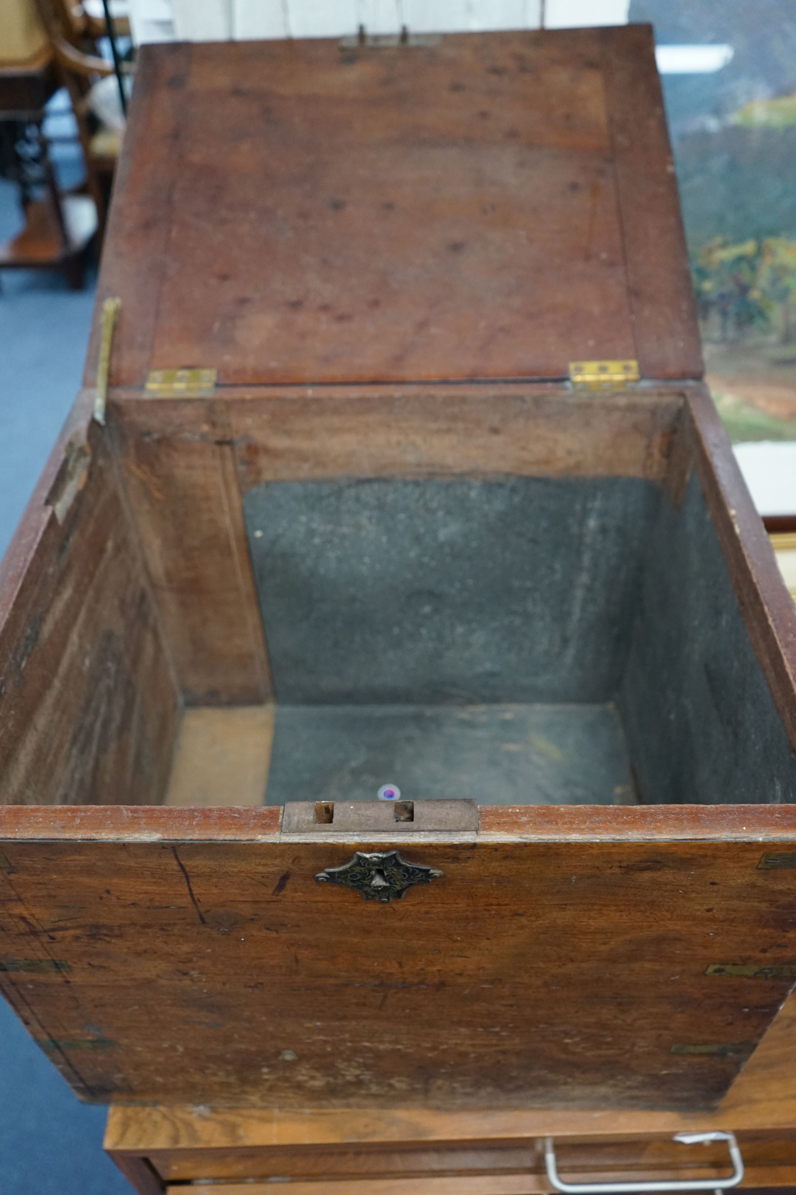 A 19th century brass-bound teak campaign trunk, having hinged top and side mounted carrying handles, width 55cm, depth 43cm, height 44cm